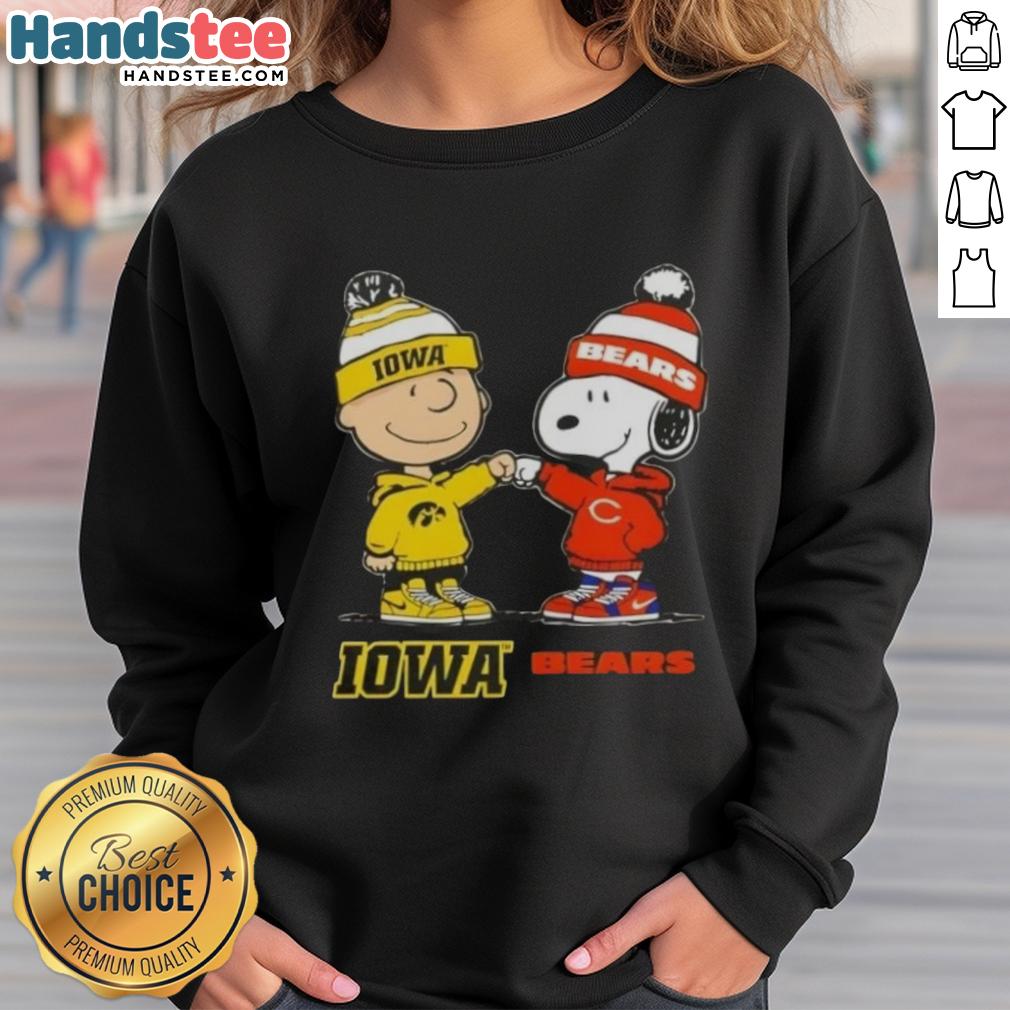 Official Charlie Brown fist bump with Snoopy on Iowa Hawks x Chicago Bears sweatshirt design.