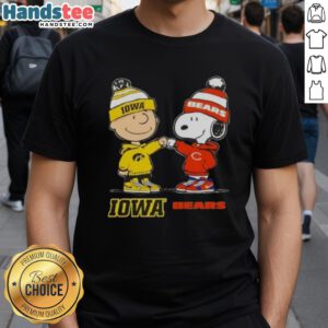 Official Charlie Brown Fist Bump Snoopy T-Shirt featuring Iowa Hawks and Chicago Bears graphics. Perfect for fans!