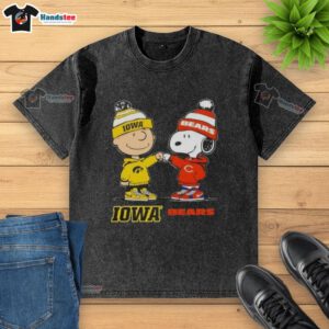 Official Charlie Brown fist bump with Snoopy on Iowa Hawks x Chicago Bears washed t-shirt, perfect for fans.