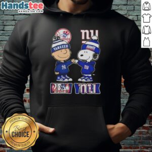 Alt Text: Official Charlie Brown fist bump with Snoopy in New York City sports hoodie featuring Yankees and Giants skyline.