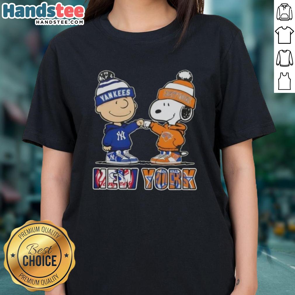 Official Charlie Brown fist bump with Snoopy on New York City sports tee for Yankees and Knicks, perfect for ladies.