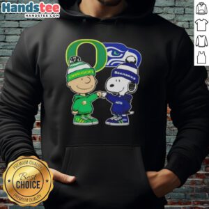 Official Charlie Brown Fist Bump Snoopy Oregon Ducks X Seattle Seahawks Hoodie featuring vibrant graphics and cozy design.