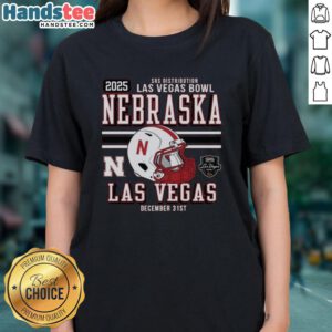 Alt Text: Official Nebraska Huskers Football 2025 Las Vegas Bowl Bound helmet design on a stylish ladies tee shirt.