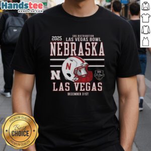 Official Nebraska Huskers Football 2025 Las Vegas Bowl Bound Helmet T-Shirt featuring team colors and logo design.