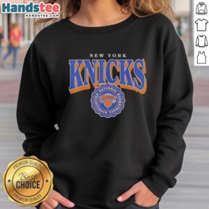 Official New York Knicks National Basketball Association sweatshirt featuring team logo and vibrant colors.
