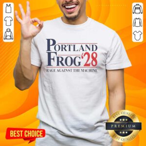 Alt Text: Official Portland Frog 2028 Rage Against The Machine T-Shirt featuring bold graphics and vibrant colors.
