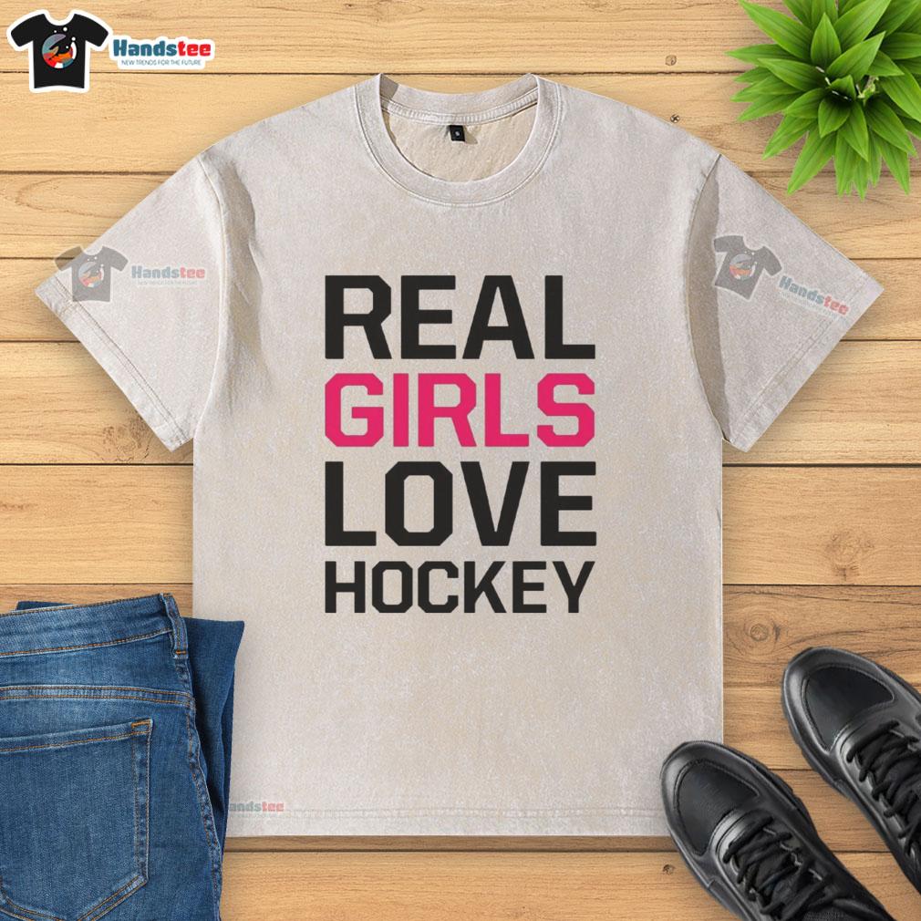 Official Real Girls Love Hockey washed t-shirt in soft fabric, featuring a stylish hockey-themed graphic for fans.