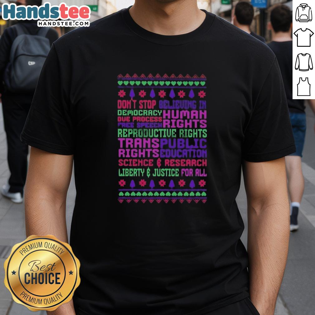 Premium Christmas T-Shirt featuring 'Don't Stop Believing In Democracy' slogan, celebrating free speech and human rights.