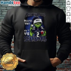 Premium Grinch Santa Hat X Seattle Seahawks NFL hoodie, perfect for Christmas fans who embrace the 'They Hate Us' spirit.