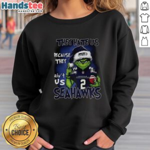 Alt Text: Premium Grinch Santa Hat sweatshirt featuring Seattle Seahawks NFL theme, perfect for festive fans celebrating Christmas.