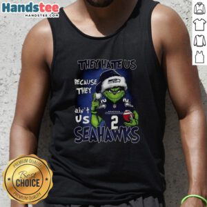 Premium Grinch Santa Hat X Seattle Seahawks NFL Christmas tank top featuring 'They Hate Us Because They Ain't Us' design.
