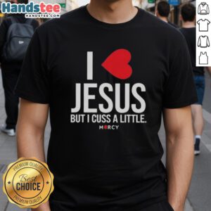Alt Text: Premium I Love Jesus But I Cuss A Little Mercy T-Shirt featuring bold text on a stylish casual tee.