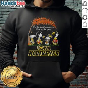 Premium Iowa Hawkeyes hoodie featuring Snoopy and friends, perfect for autumn and celebrating the most wonderful time of the year.