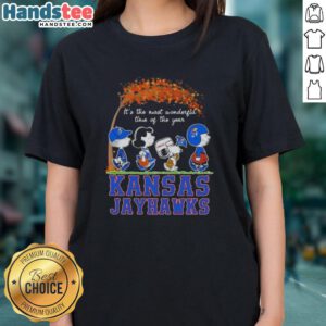 Premium Kansas Jayhawks X Peanuts Snoopy tee for ladies, celebrating autumn and the joy of the season.
