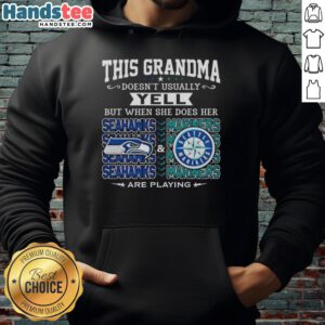 Grandma in a Seattle Seahawks hoodie cheering for the Seahawks and Mariners, showcasing her team spirit.