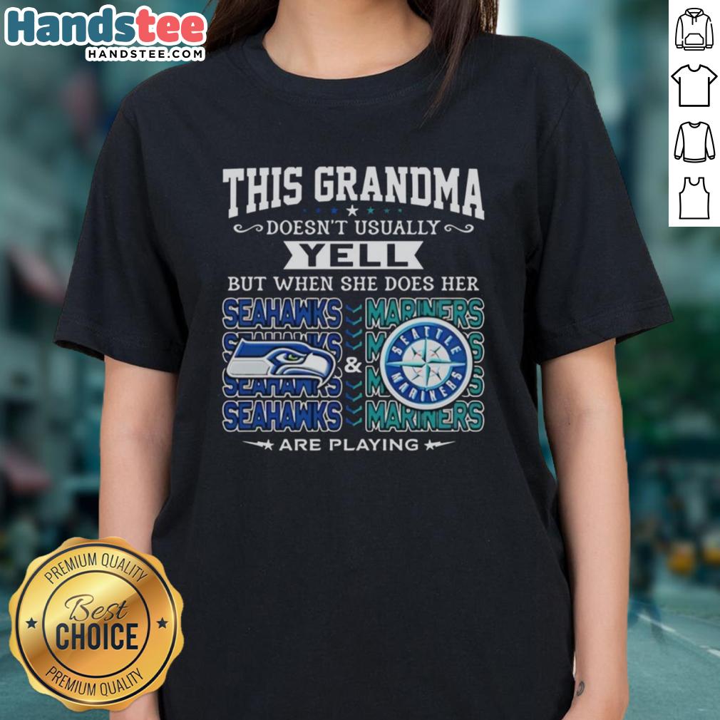 Grandma cheering in a Seattle Seahawks tee, showcasing her love for the Seahawks and Mariners in a vibrant moment.