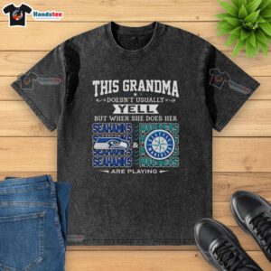 Grandma cheering in a faded Seattle Seahawks and Mariners t-shirt, showcasing her passion for Seattle sports.