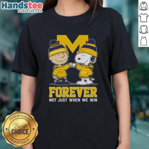 Adorable Snoopy and Charlie Brown graphic on a Michigan Wolverines ladies tee, celebrating team spirit year-round.