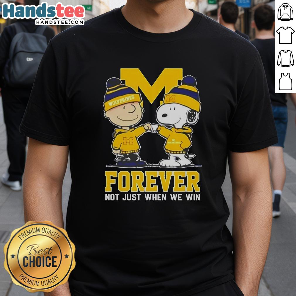 Alt Text: Cute Peanut Snoopy and Charlie Brown on a Michigan Wolverines Forever T-Shirt, perfect for fans not just when they win.