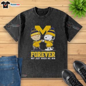 Cute Peanut Snoopy and Charlie Brown on Michigan Wolverines Forever t-shirt, celebrating fandom beyond just winning.