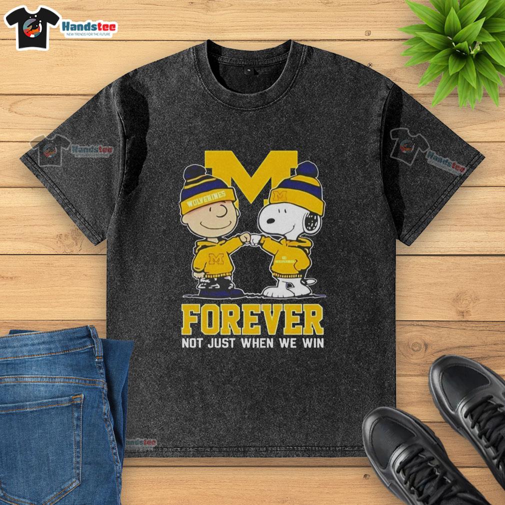 Cute Peanut Snoopy and Charlie Brown on Michigan Wolverines Forever t-shirt, celebrating fandom beyond just winning.