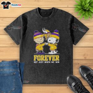 Cute Snoopy and Charlie Brown on a Minnesota Vikings 'Forever Not Just When We Win' washed t-shirt design.