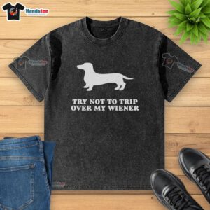 Funny Try Not To Trip Over My Wiener Washed T-Shirt featuring a humorous graphic design of a wiener dog.