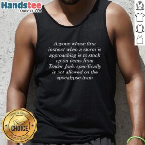 Person wearing a tank top, preparing for a storm by stocking up on essential items at a local store.
