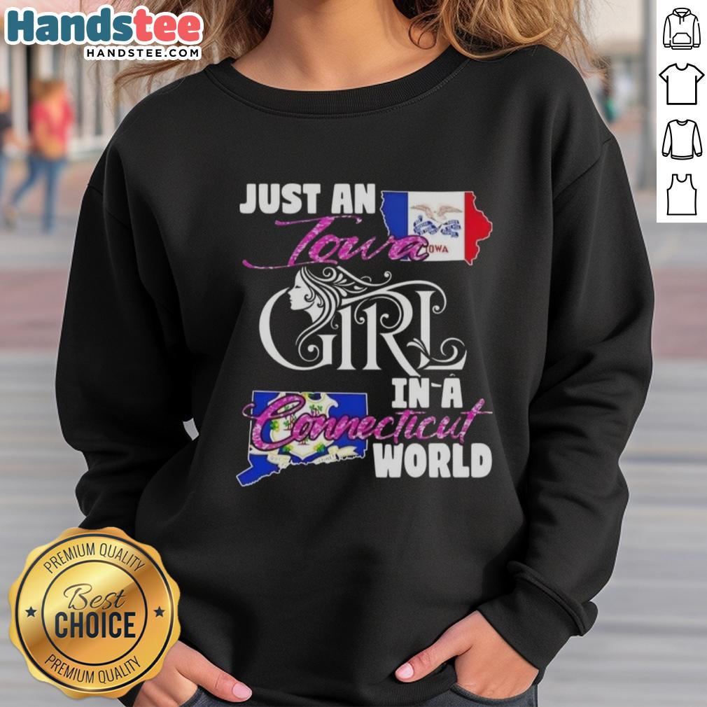 Iowa girl in a cozy sweatshirt reading 'Good Just an Iowa Girl in a Connecticut World' for a stylish look.
