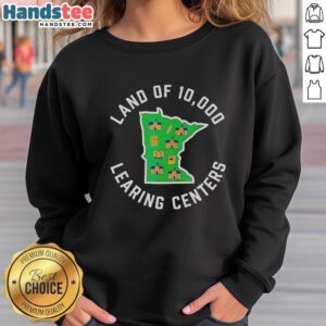 Good Land of 10,000 Learning Centers sweatshirt featuring vibrant design, perfect for promoting education and community.