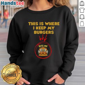 Good-This-Is-Where-I-Keep-My-Burgers-Bite-Me-Sweatshirt displayed on a hanger, ideal for burger lovers.