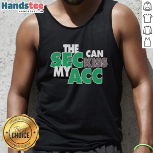 Cheerful Miami Hurricanes fan wearing 'SEC Can Kiss My ACC' tank top, showcasing team spirit and pride at a game.
