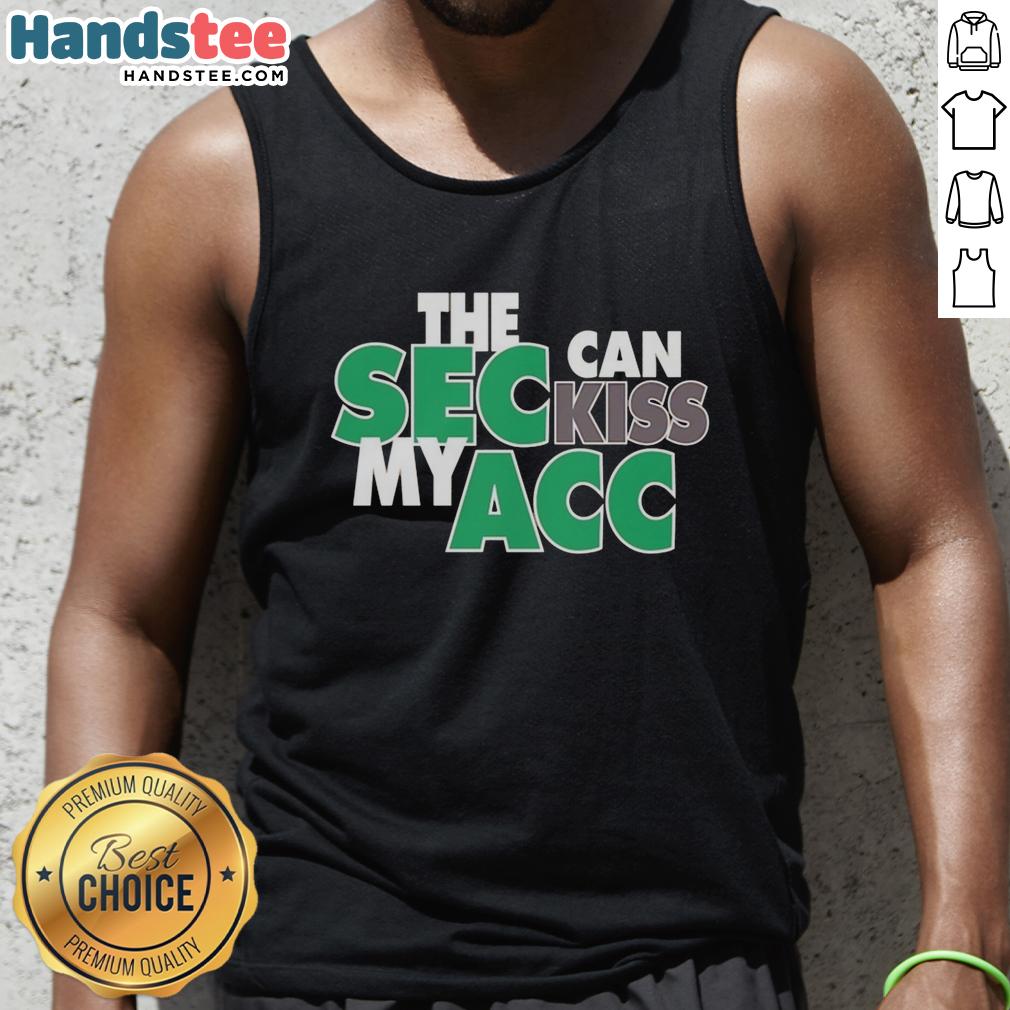 Cheerful Miami Hurricanes fan wearing 'SEC Can Kiss My ACC' tank top, showcasing team spirit and pride at a game.