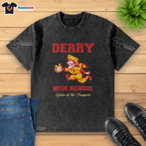 Nice Derry High School Home of the Trappers washed t-shirt displayed on a hanger, showcasing school spirit and style.