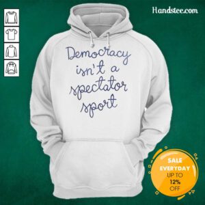 Official Democracy Is Not A Spectator Sport hoodie worn by Nicolle Wallace, promoting civic engagement and participation.