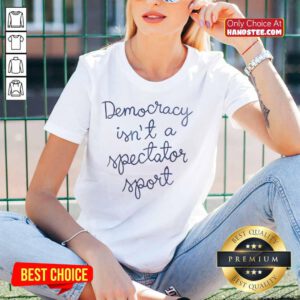 Official Democracy Is Not A Spectator Sport Nicolle Wallace Ladies Tee design featuring bold text on a stylish women's shirt.