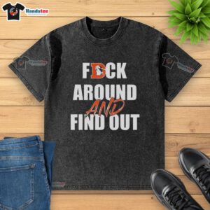 Official Fck Around And Find Out Denver Broncos washed t-shirt with bold graphics for fans and casual wear.