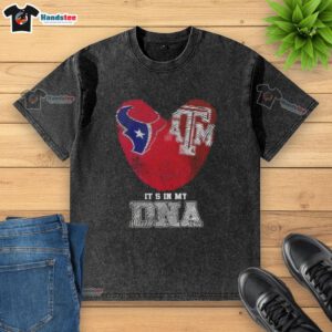 Official Houston Texans X Texas A&M Aggies 'It's In My DNA' washed t-shirt featuring team logos and vibrant colors.