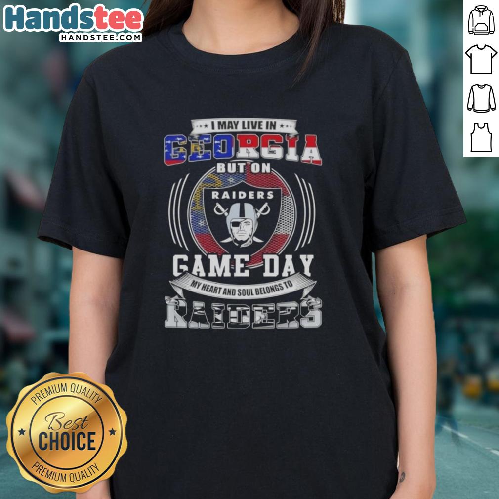 Alt Text: Official I May Live In Georgia But My Heart Belongs To Las Vegas Raiders Football Ladies Tee in black.