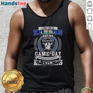 Alt Text: Kansas fan wearing a Raiders football tank top showing support for Las Vegas Raiders on game day.