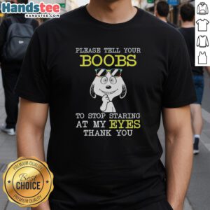 Official Snoopy t-shirt with humorous text 'Please Tell Your Boobs To Stop Staring At My Eyes Thank You' design.