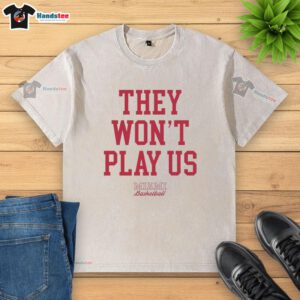 Alt Text: Official They Won't Play Us Miami Basketball Washed T-Shirt featuring a bold graphic design and comfortable fit.
