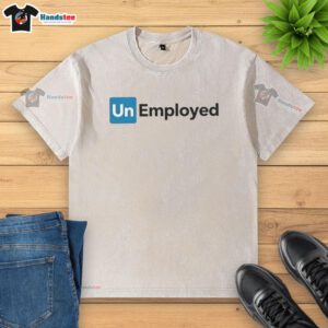 Official Unemployed logo on a washed t-shirt, showcasing a stylish and casual look for the unemployed community.