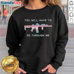 Official 'You Will Have To Go Through Me' Trans Gun Sweatshirt featuring bold text and a stylish design for proud supporters.