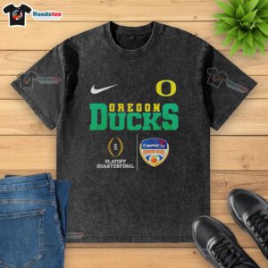 Alt Text: Original Oregon Ducks NCAA 2026 Cotton Bowl Champions washed t-shirt, featuring vibrant team colors and logo design.