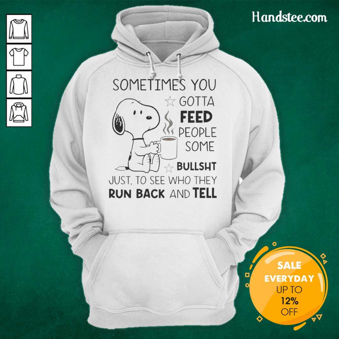 Snoopy hoodie with the quote 'Sometimes you gotta feed people some bullsht' displayed in bold lettering.
