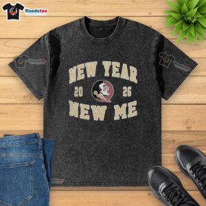 Alt Text: Pretty Florida State Seminoles Football New Year New Me 2026 logo on a washed t-shirt design.