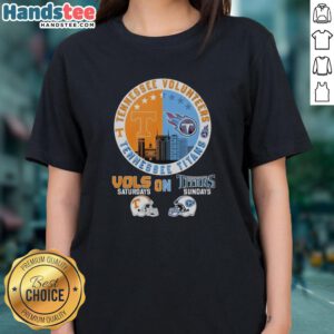 Alt Text: Pretty Tennessee Volunteers and Titans helmet logo mashup on a ladies tee for game day style.