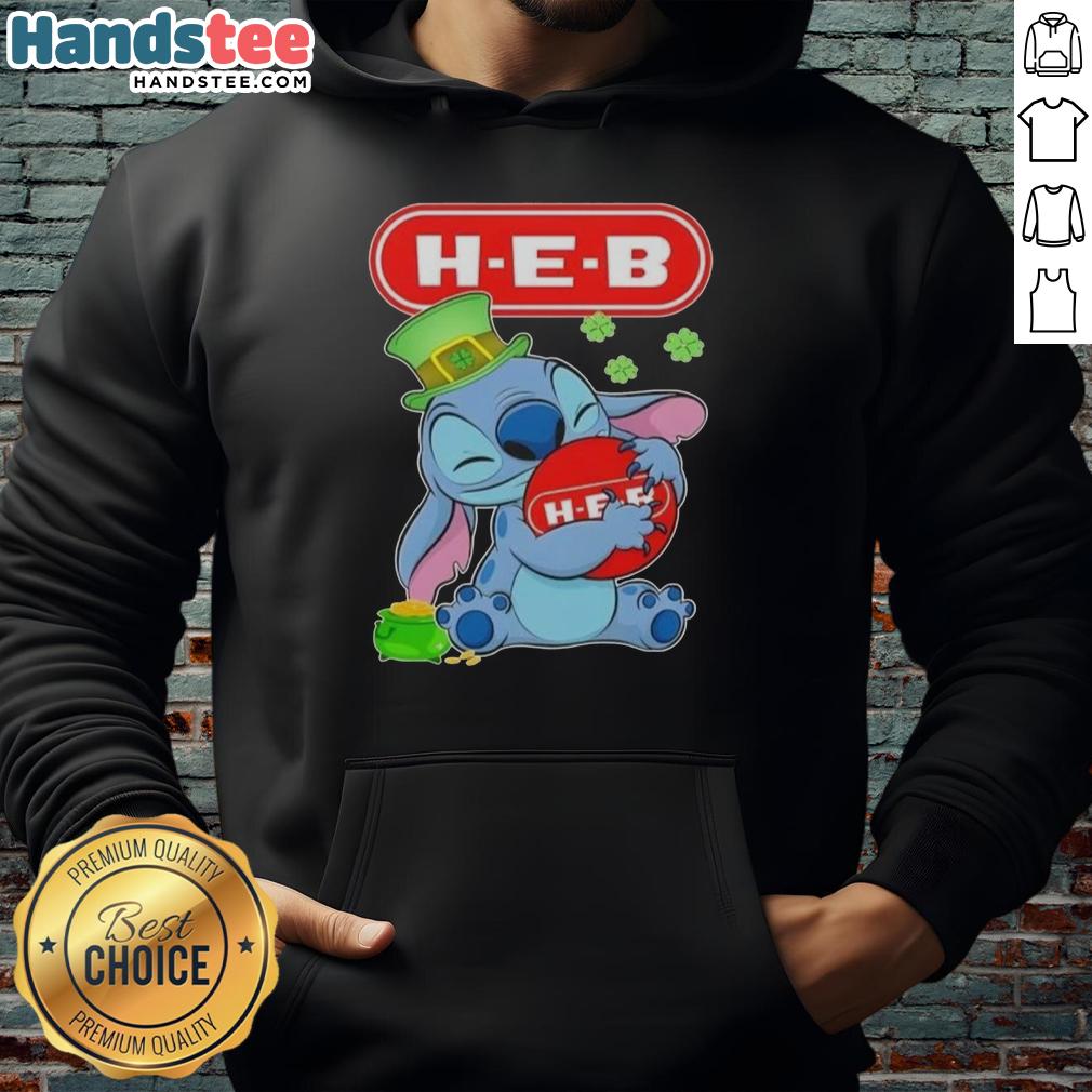 Cute Stitch hugging H-E-B logo on a St. Patrick's Day hoodie, perfect for festive celebrations and cozy wear.