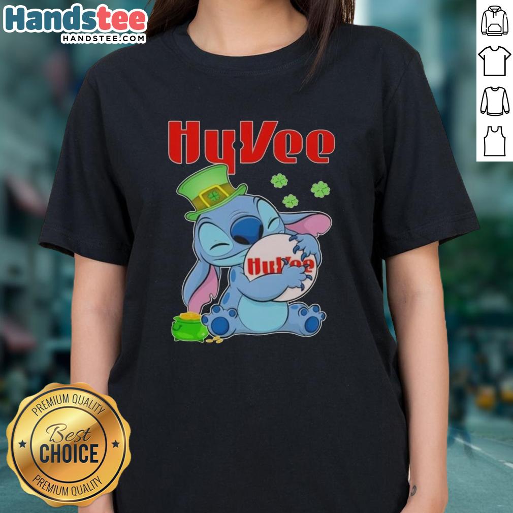 Cute Stitch Hug Hy-Vee logo on a St. Patrick's Day ladies tee, perfect for festive celebrations and stylish comfort.
